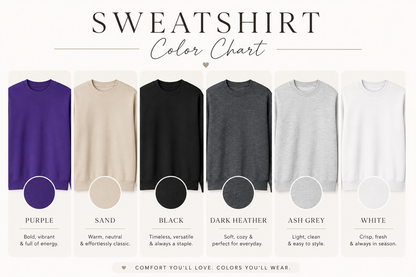A color chart graphic for sweatshirts showing six color options: purple, sand, black, dark heather, ash grey, and white. Each sweatshirt is displayed with a circular color swatch below it and descriptive text labels underneath.